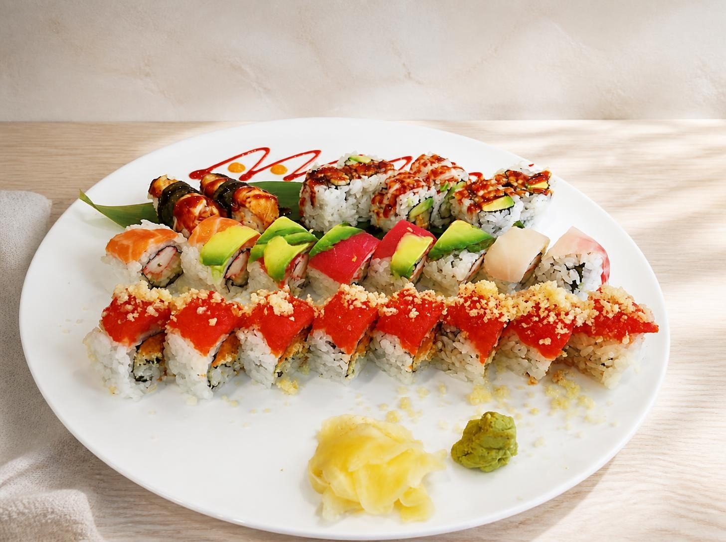 Platter of colorful sushi rolls with ginger and wasabi